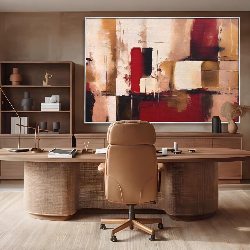 Tablou canvas cu pictura abstracta cu patrate rosii si bej, in rama de aluminiu argintiu, pe perete intr-un birou